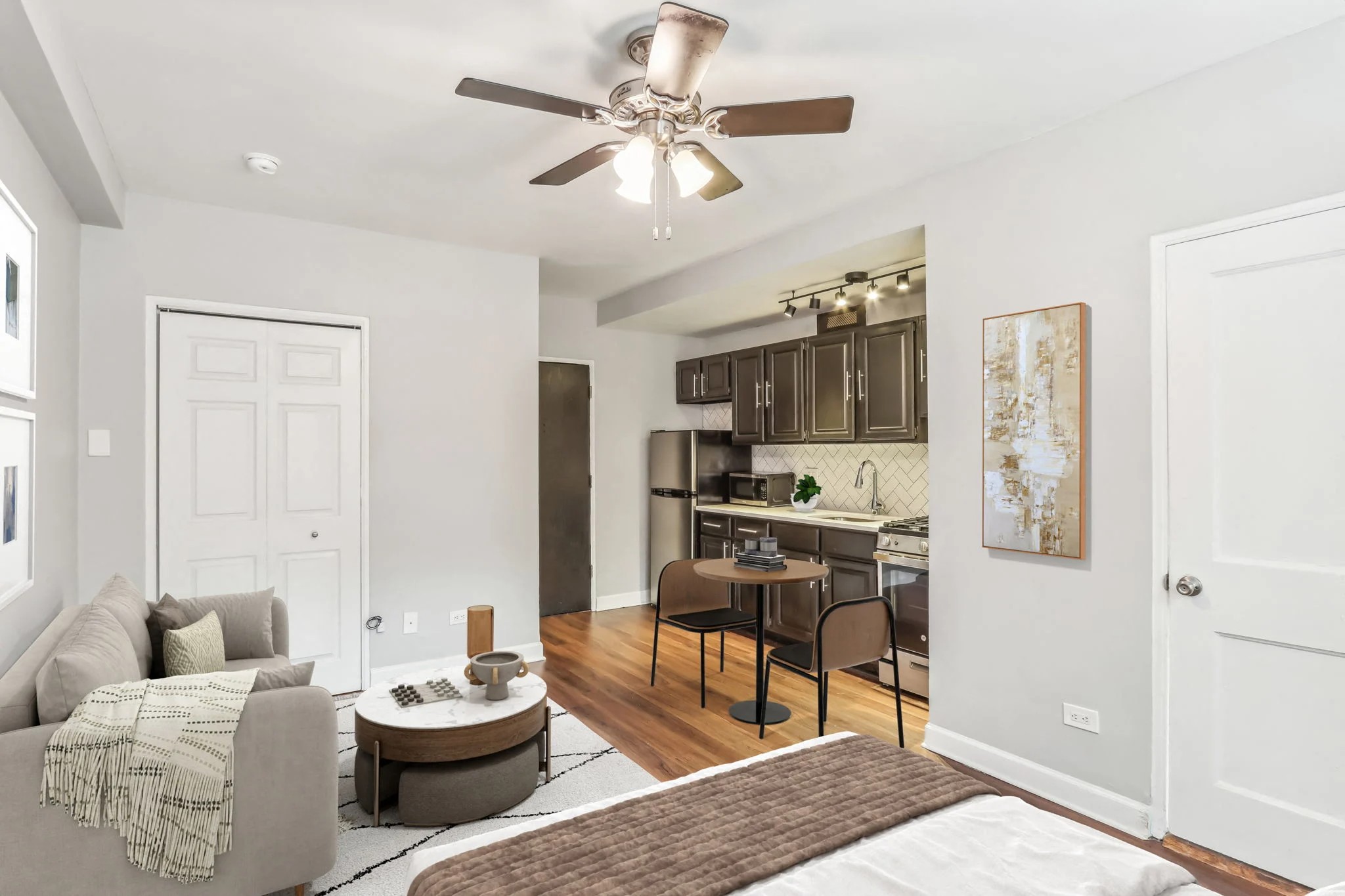 The Oliver on LaSalle apartment with an open kitchen and living room